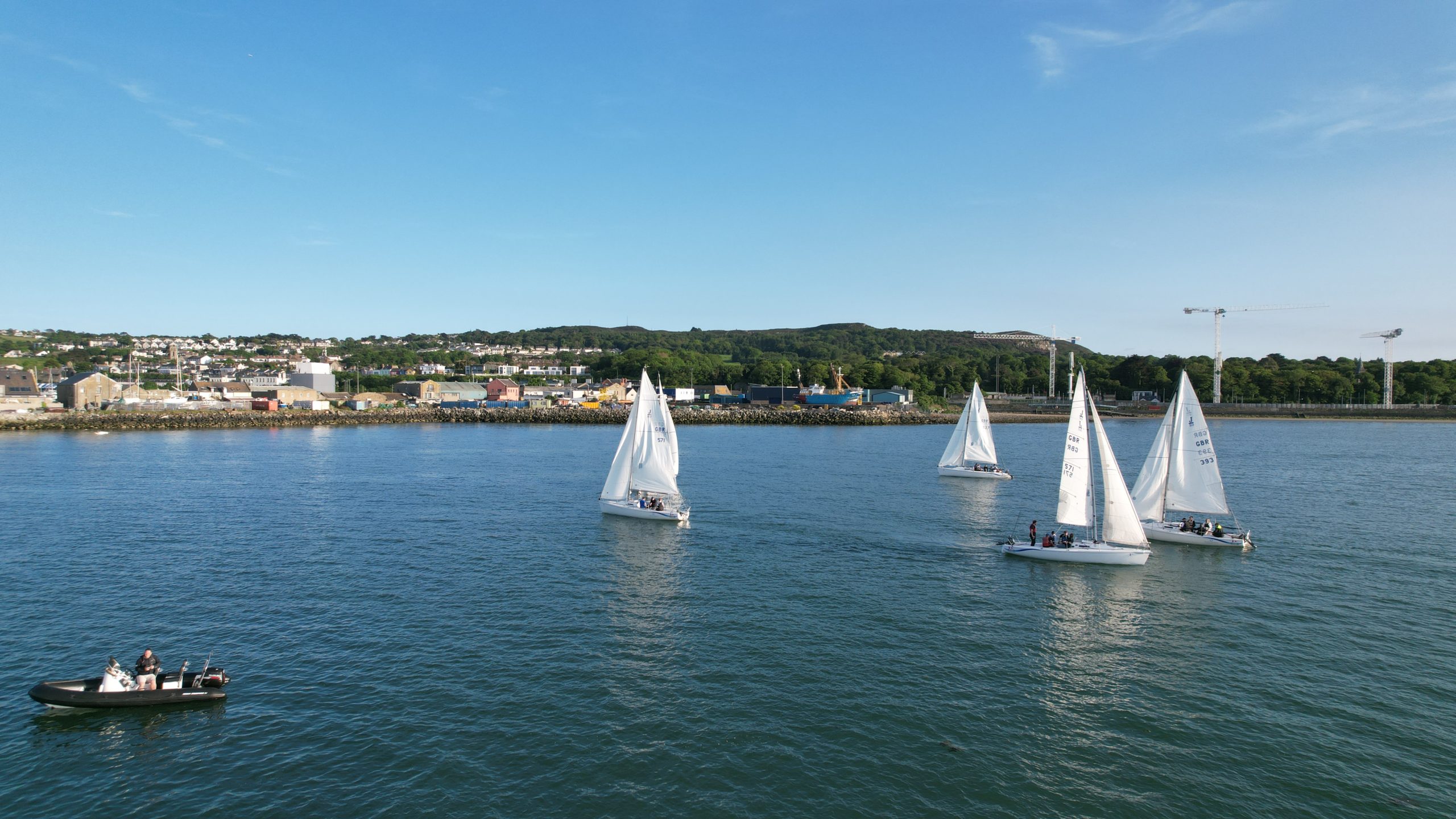 Beginner sailors practicing boat handling and navigation during the Learn to Sail course in Howth Sound with Quest Howth